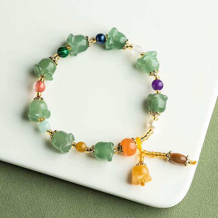 Braccialetto della fortuna con fiore di magnolia, avventurina verde Buddha Stones
