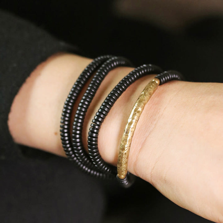 Bracciale multistrato in legno di ebano e rame Buddha Stones Balance