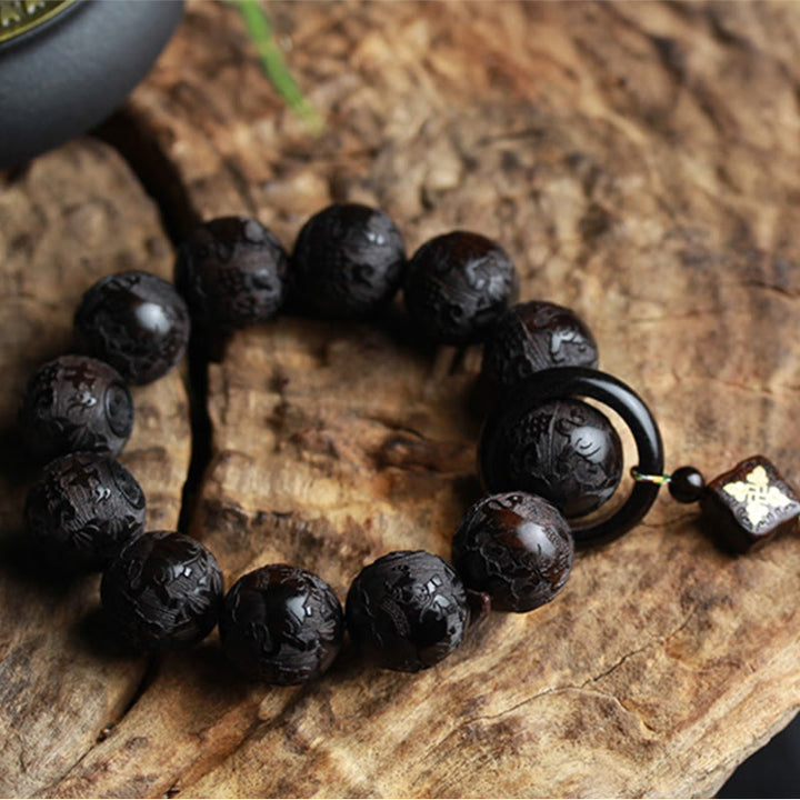 Braccialetto di equilibrio con zucca inciso con carattere cinese Yin Yang in legno di ebano Buddha Stones