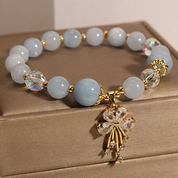 Braccialetto con ciondolo a farfalla in zircone con cristalli rosa e acquamarina Buddha Stones