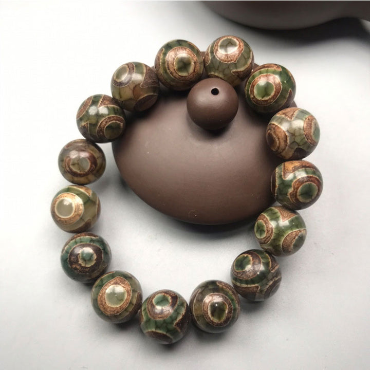 Braccialetto portafortuna in sardonice con perline Dzi a tre occhi Buddha Stones