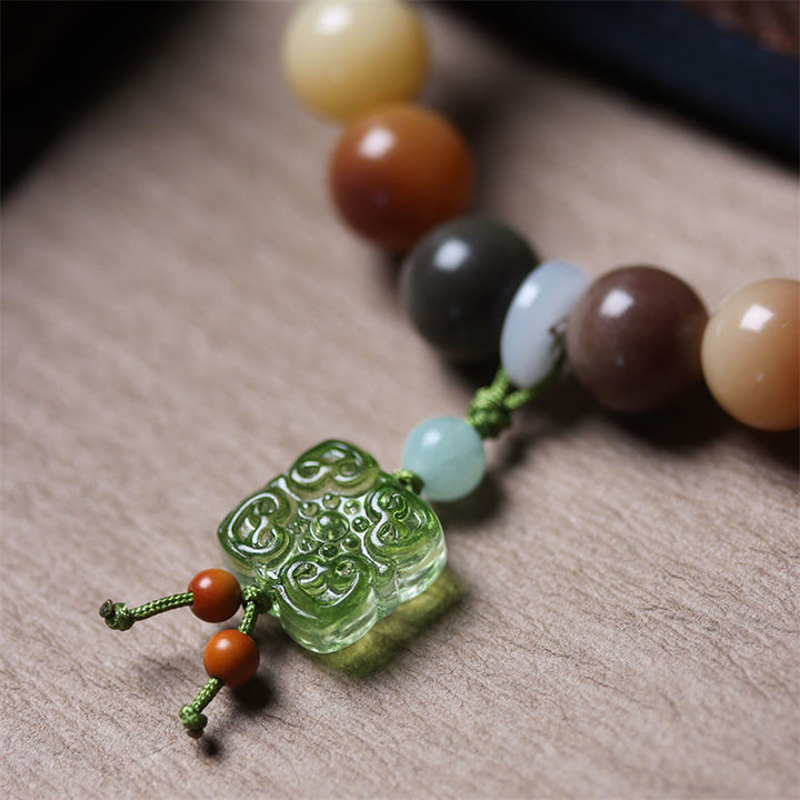 Braccialetto della pace con ciondolo in vetro Liuli con semi di Bodhi multicolore sfumato naturale Buddha Stones