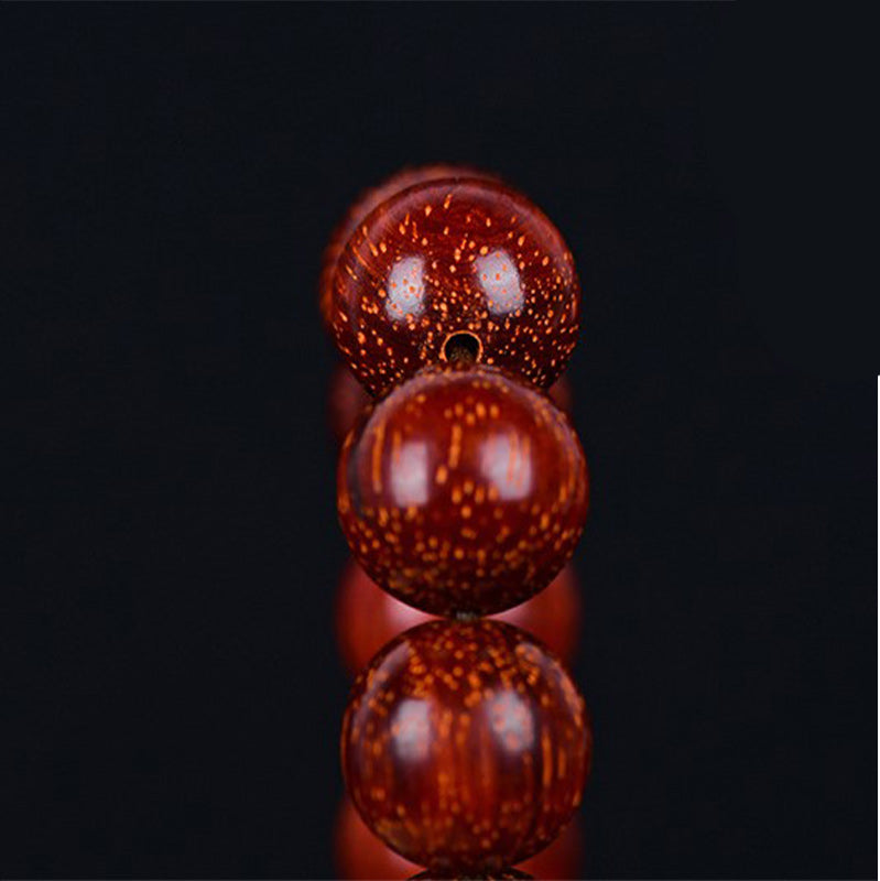 Braccialetto di equilibrio in legno di sandalo rosso con foglia piccola tibetana Buddha Stones