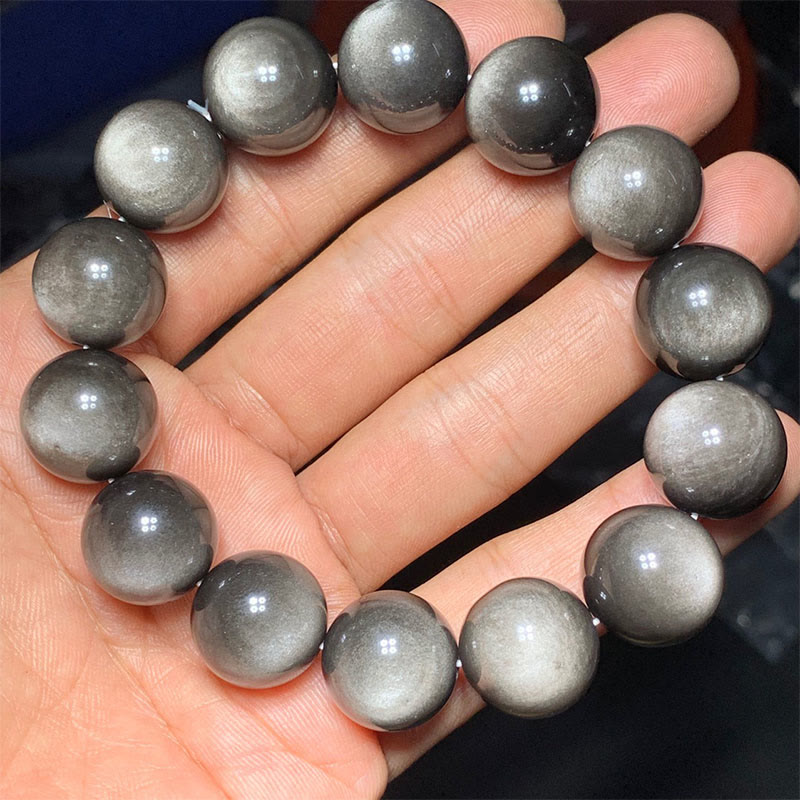 Braccialetto di protezione lenitiva in ossidiana lucida d'argento naturale Buddha Stones