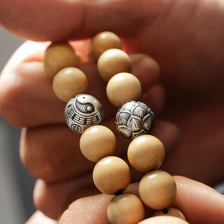 Bracciale di ricchezza e fortuna di legno di pesca del Tibet, loto, cinabro, Bagua Yin Yang