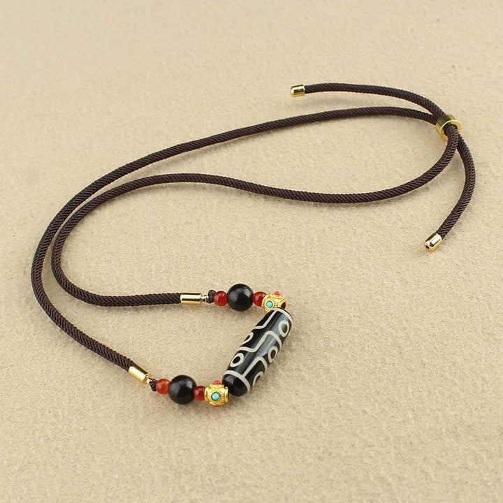 Buddha Stones Tibetano Nove Occhi Dzi Bead Protezione Benedizioni Collana Pendente
