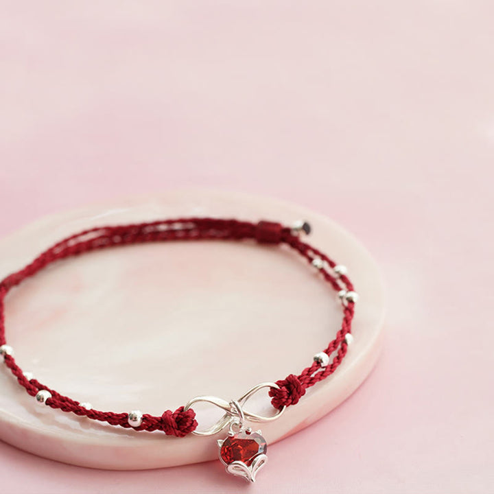 Cavigliera intrecciata con Buddha Stones, simbolo dell'amore, cuore e infinito
