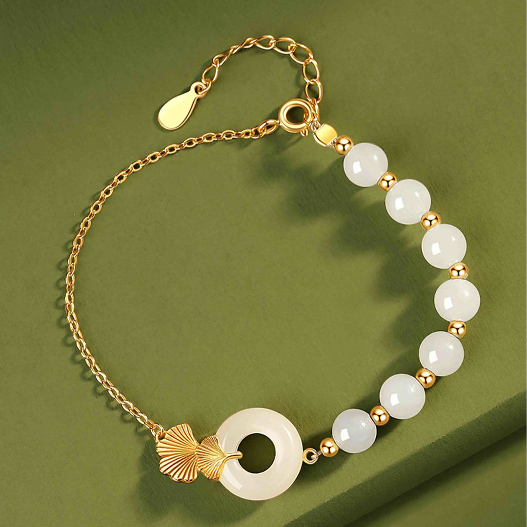 Braccialetto della fortuna con foglia di ginkgo e fibbia della pace in argento sterling 925 con Buddha Stones e giada bianca Hetian