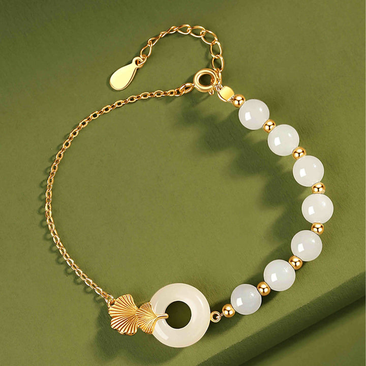 Braccialetto della fortuna con foglia di ginkgo e fibbia della pace in argento sterling 925 con Buddha Stones e giada bianca Hetian
