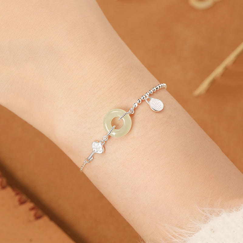 Bracciale con catena portafortuna in argento sterling 925 con fibbia della pace in giada Hetian e carattere Fu Buddha Stones