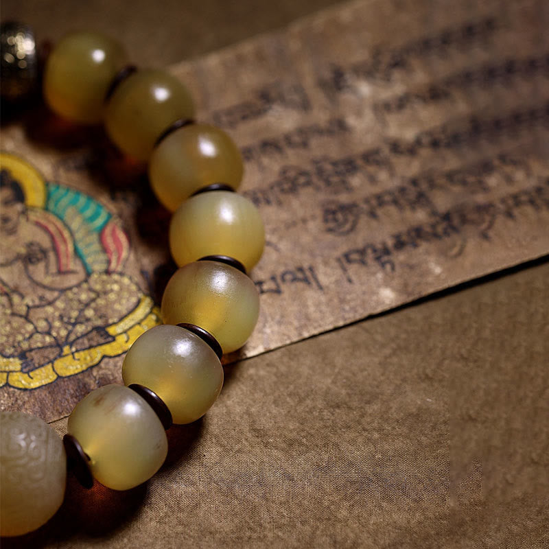 Braccialetto di auspicio Om Mani Padme Hum in corno di pecora tibetano fatto a mano con Buddha Stones