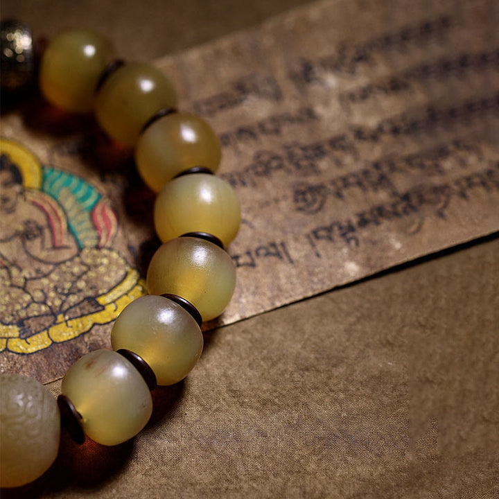 Braccialetto di auspicio Om Mani Padme Hum in corno di pecora tibetano fatto a mano con Buddha Stones
