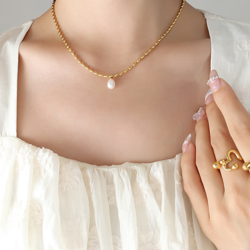 Collana con ciondolo di perle e perle della pace