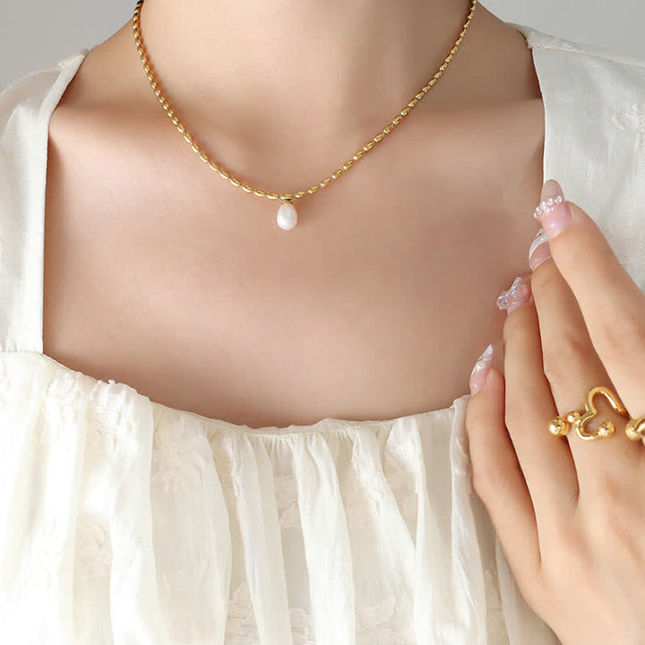 Collana con ciondolo di perle e perle della pace