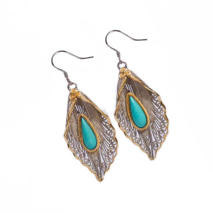 Orecchini pendenti con motivo a foglia di Bodhi in argento sterling 925 con Buddha Stones e turchese
