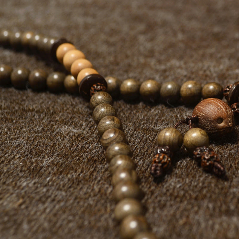 Bracciale Mala con ciondolo di protezione in legno di sandalo tibetano Buddha Stones