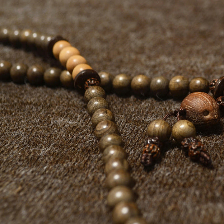 Bracciale Mala con ciondolo di protezione in legno di sandalo tibetano Buddha Stones - image 13