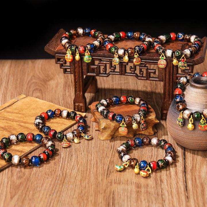 Buddha Stones Cinque Elementi Oro Bestia che deglutisce Fascino Famiglia Braccialetto Portafortuna con Perline di Vetro Liuli