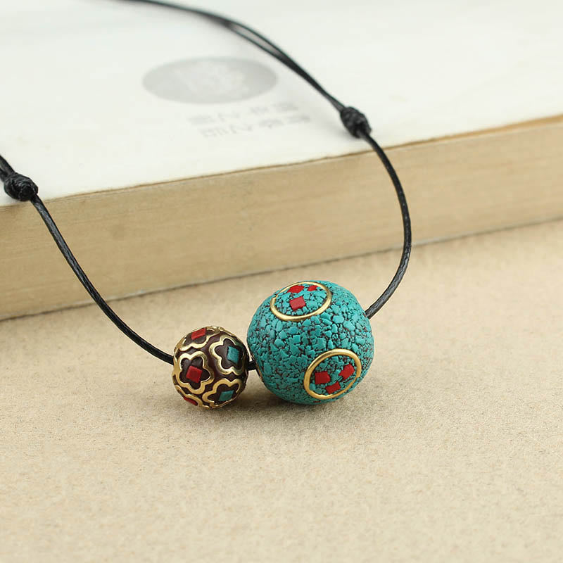 Collana con ciondolo con doppia perla turchese tibetana Buddha Stones, protezione e forza