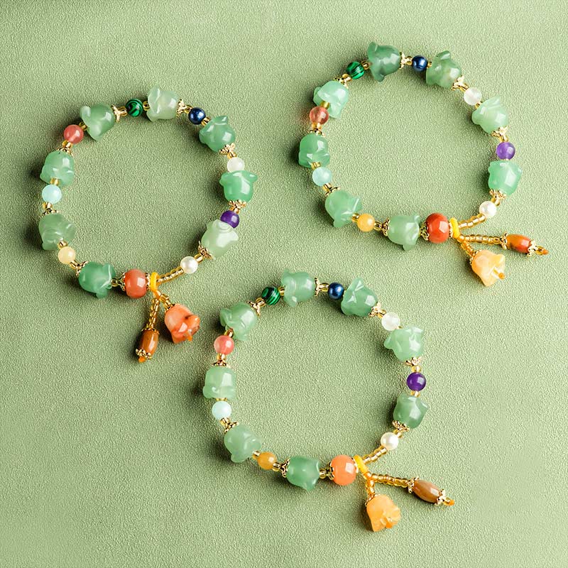 Braccialetto della fortuna con fiore di magnolia, avventurina verde Buddha Stones