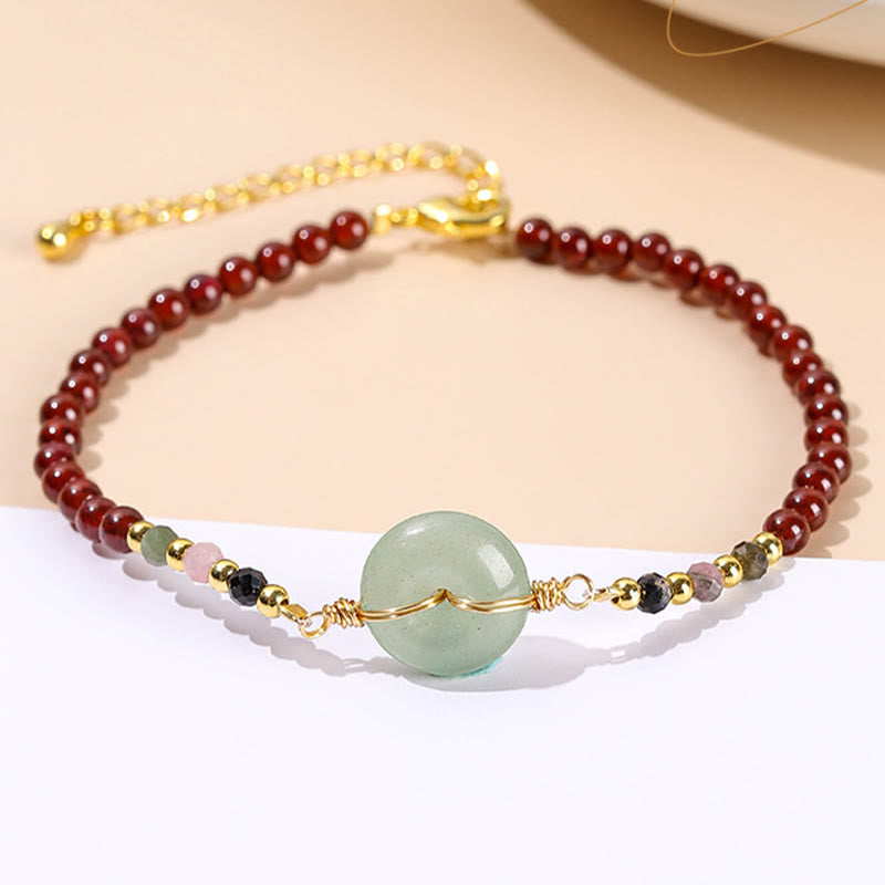 Braccialetto di perline con fibbia della pace in granato naturale Buddha Stones