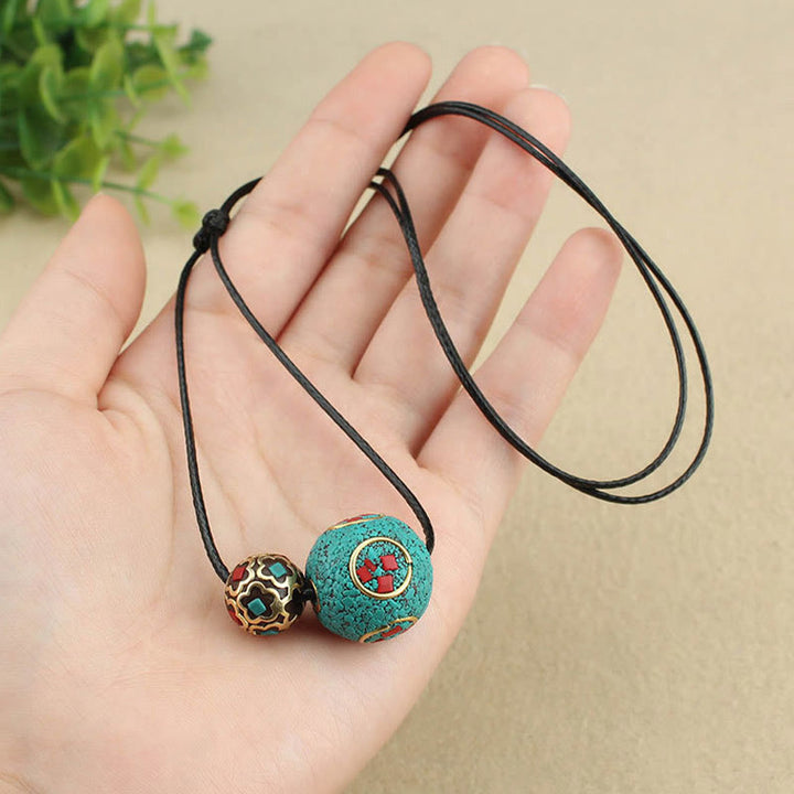 Collana con ciondolo con doppia perla turchese tibetana Buddha Stones, protezione e forza