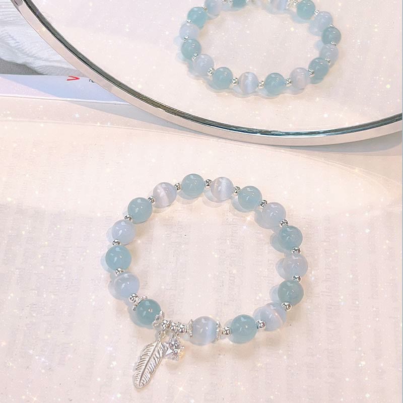 Bracciale con ciondolo a forma di stella di piuma con occhio di gatto e acquamarina in argento sterling 925 Buddha Stones