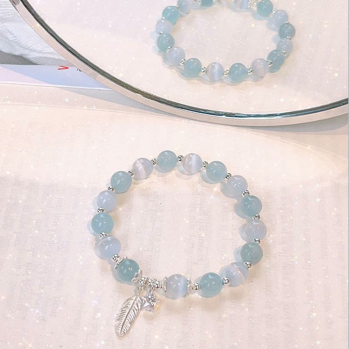 Bracciale con ciondolo a forma di stella di piuma con occhio di gatto e acquamarina in argento sterling 925 Buddha Stones