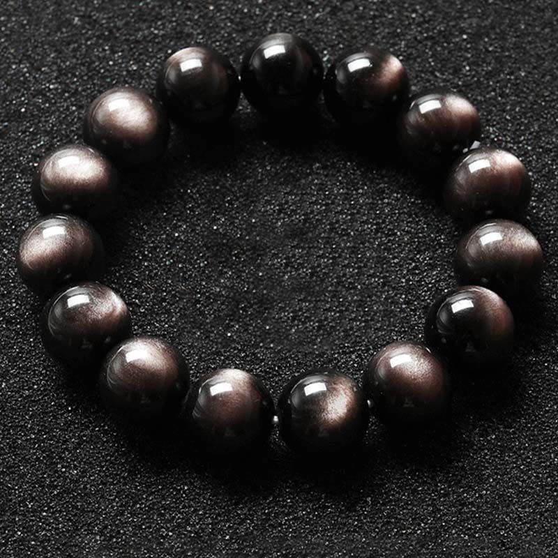 Braccialetto di protezione lenitiva in ossidiana lucida d'argento naturale Buddha Stones