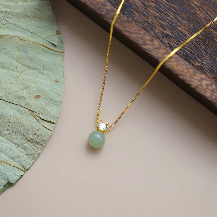 Collana con ciondolo a catena con perline portafortuna in giada Buddha Stones