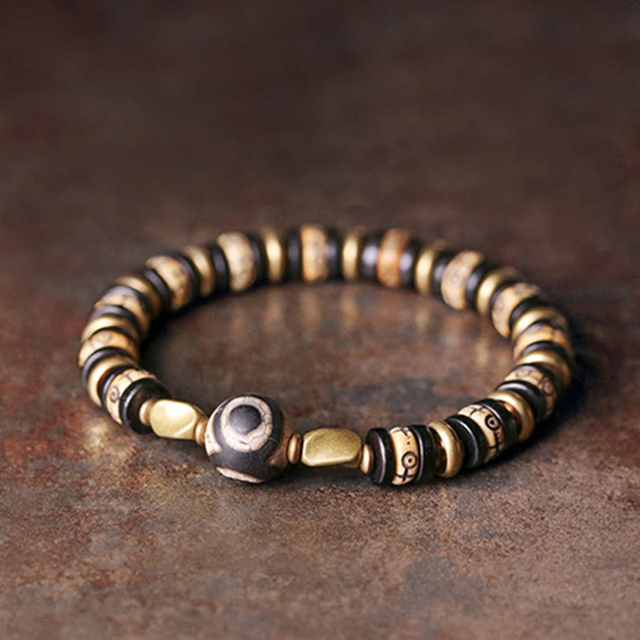 Braccialetto di forza in perline di osso tibetano e legno di ebano con Buddha Stones