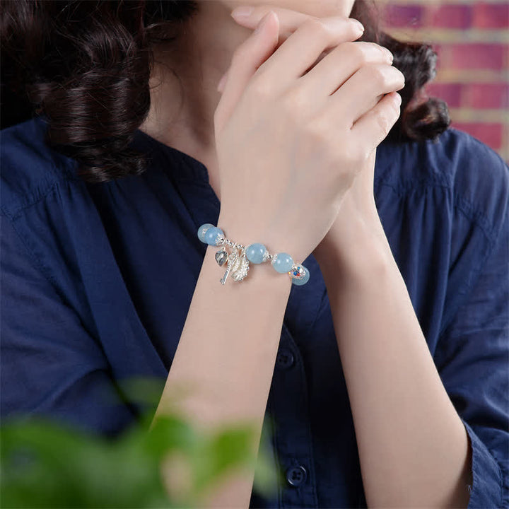 Bracciale con ciondolo a forma di chiave dell'amore con fiore di serenità in argento sterling 925 e acquamarina naturale Buddha Stones - image 2