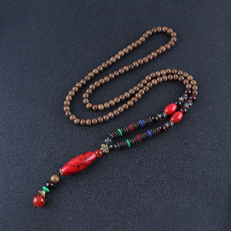 Collana con ciondolo in pietra turchese, pietra di legno di wenge, protezione e calma Buddha Stones