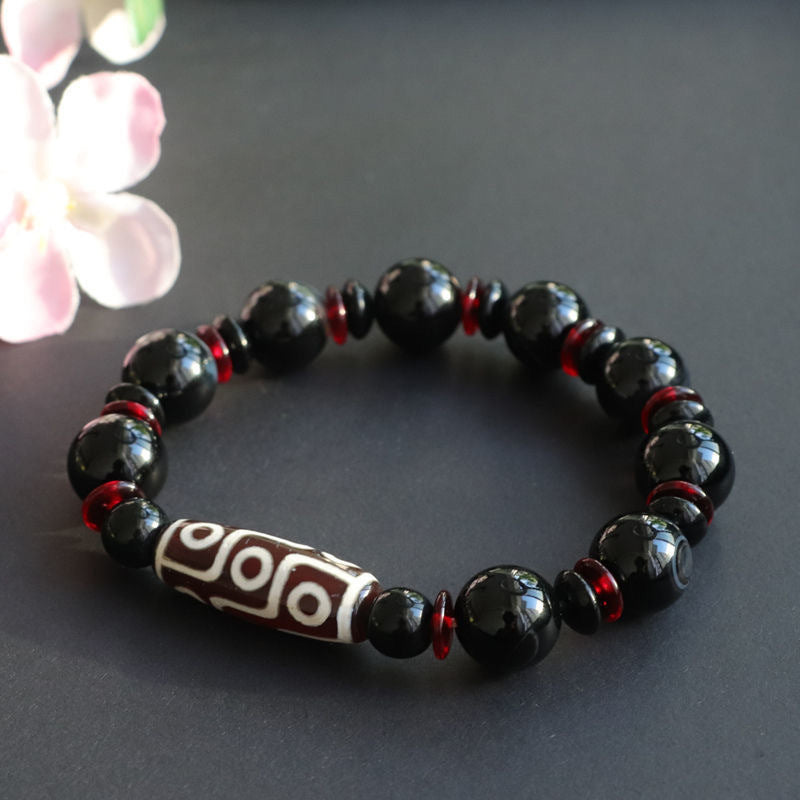 Braccialetto di protezione della ricchezza con perline Dzi a nove occhi in onice nero Buddha Stones