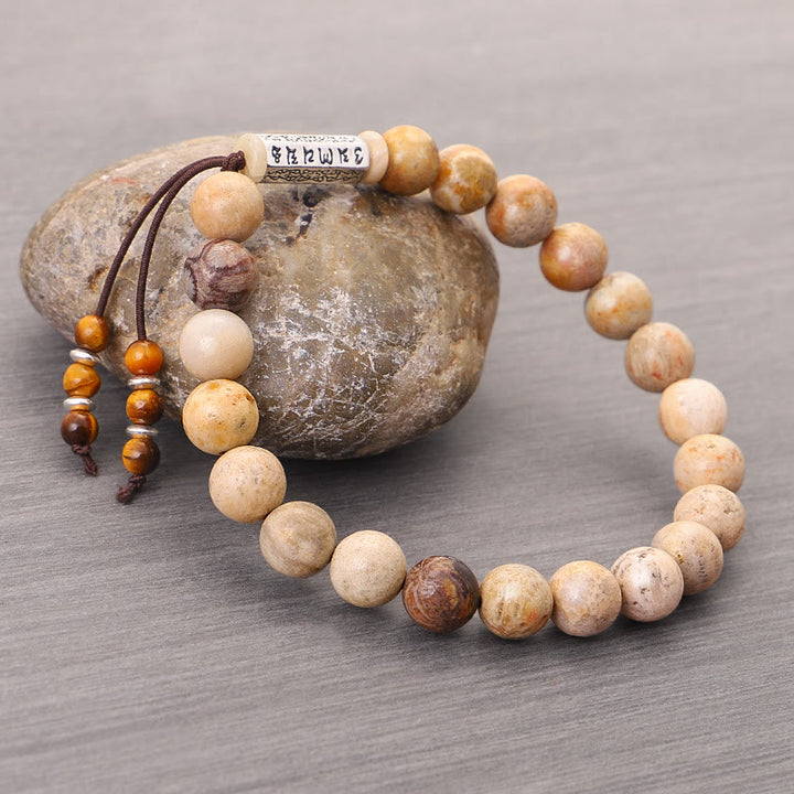 Braccialetto rinforzante in pietra invecchiata Om Mani Padme Hum Buddha Stones