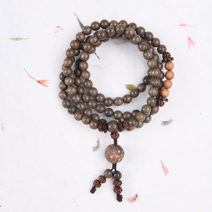 Bracciale Mala con ciondolo di protezione in legno di sandalo tibetano Buddha Stones - 108 perle Mala - 10 mm - image 10