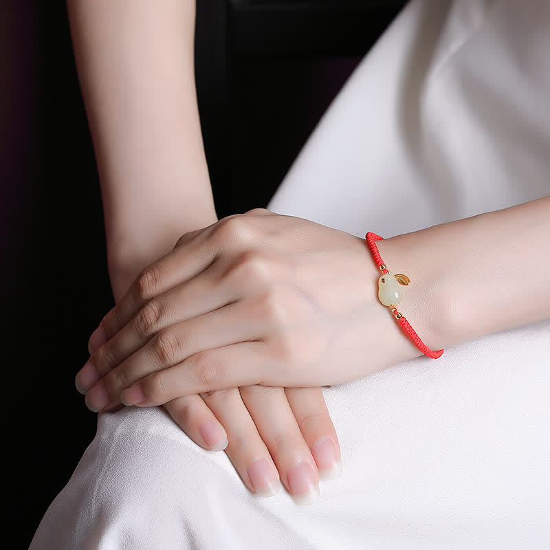 Braccialetto di protezione con corda rossa e giada bianca Hetian dell'anno del coniglio in argento sterling 925 Buddha Stones