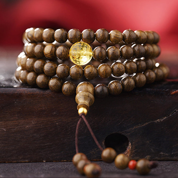 Buddha Stones 108 Mala Beads 999 Oro Brunei Agarwood Cuore Sutra Ambra Agata Rossa Forza Bracciale Meditazione