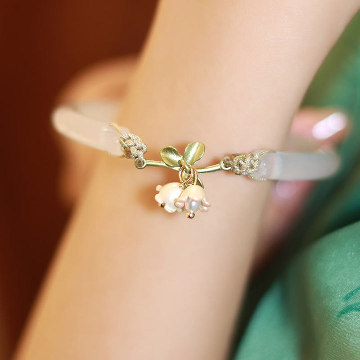 Braccialetto con fiore di mughetto, felicità e forza