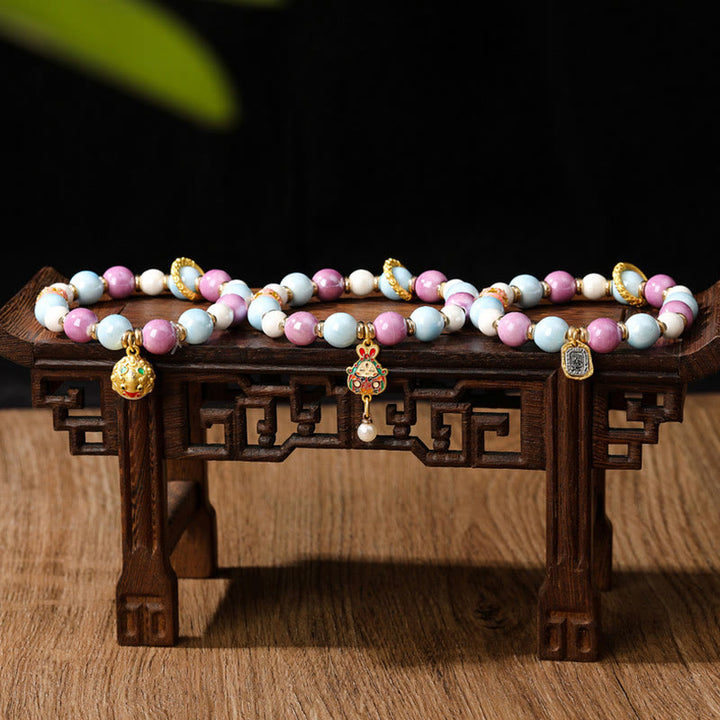 Buddha Stones Tibetano Zakiram Dea della Ricchezza Coniglio Testa di Leone Ciondolo Liuli Vetro Incenso Cenere Perline di Porcellana Braccialetto di Protezione