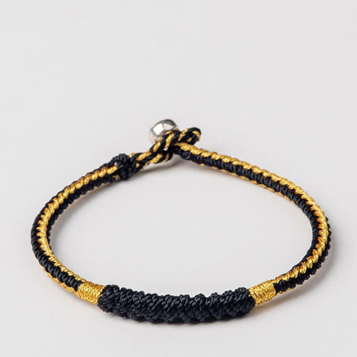 Braccialetto di protezione con corda portafortuna intrecciata fatta a mano in Buddha Stones tibetane