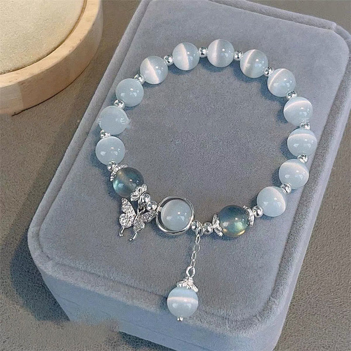 Braccialetto di supporto con ciondolo a forma di stella a forma di farfalla, pietra di luna e occhio di gatto Buddha Stones