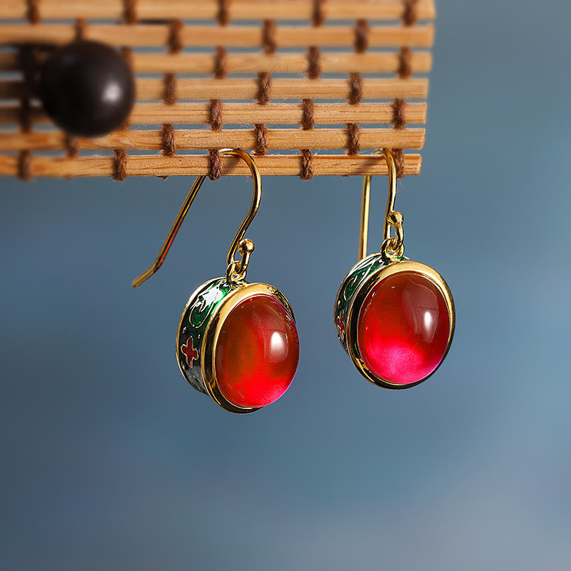 Orecchini pendenti rotondi con gancio in corindone rosso Buddha Stones Confidence
