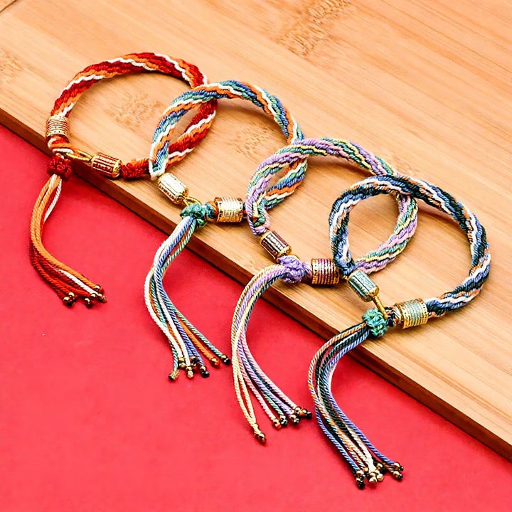 Buddha Stones Bracciale tibetano con nappe colorate in smalto e corda - image 0