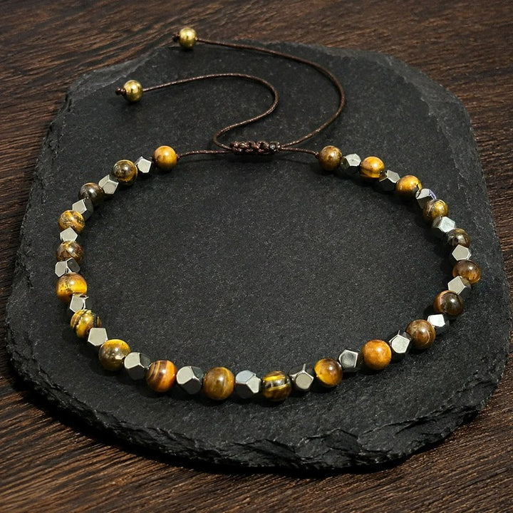 Buddha Stones Bracciale regolabile intrecciato con magnetite nera occhio di tigre e simbolo di fiducia - image 1