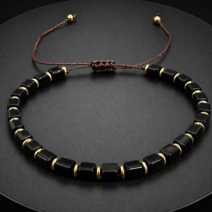 Buddha Stones Bracciale regolabile intrecciato con perline quadrate di ossidiana nera, simbolo di protezione. - image 1