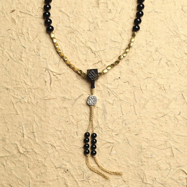 Buddha Stones Tibetano 108 Mala Beads Onice Nero Tre Occhi Dzi Beads Bracciale di Protezione