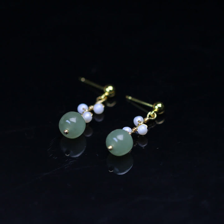 Orecchini pendenti con motivo floreale in giada Hetian placcati in oro 14K