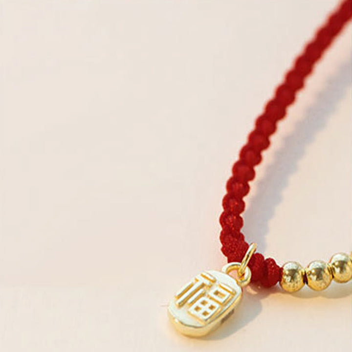 Braccialetto di corda con ciondolo a forma di carattere Fu fatto a mano con Buddha Stones