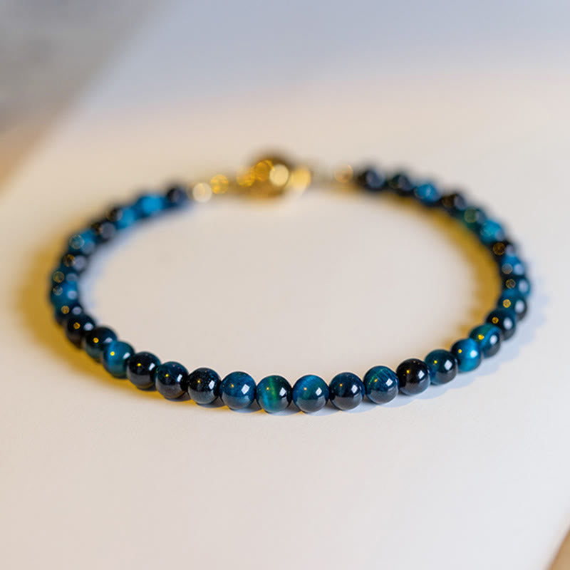 Braccialetto di protezione con catena in pietra naturale occhio di tigre blu Buddha Stones